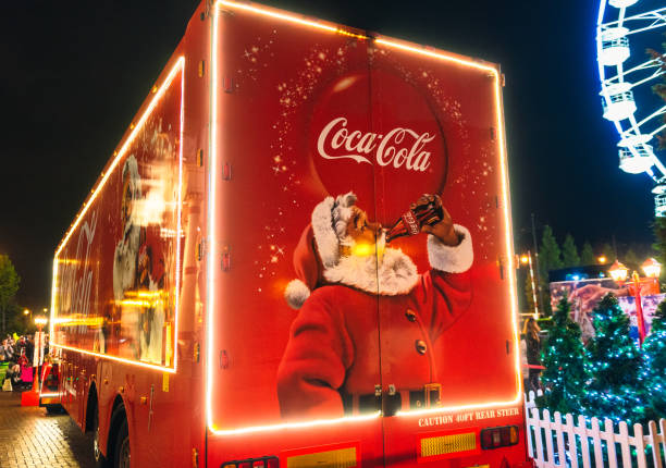 coca-cola christmas truck - junk food stock pictures, royalty-free photos & images