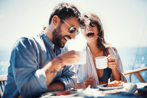 coffee and fun on the sailing. - coffee stock pictures, royalty-free photos & images