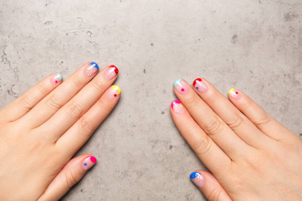 colorful playful manicure - nails art stock pictures, royalty-free photos & images