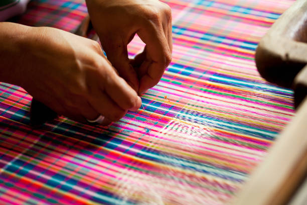 colorful silk threads on the loom - fashion stock pictures, royalty-free photos & images
