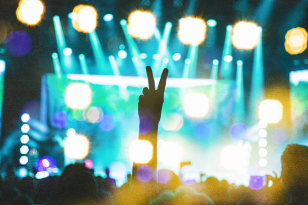 concert lights, concert, concert crowd, peace sign - concert stock pictures, royalty-free photos & images