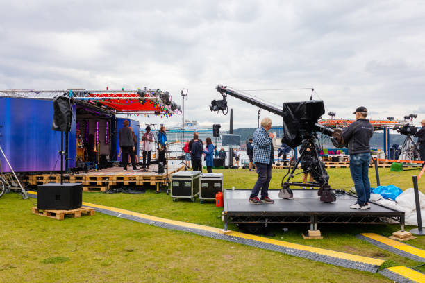 concert video shooting near the building of the museum of modern art in oslo - concert stock pictures, royalty-free photos & images