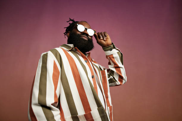 confident mature man wearing sunglasses - fashion stock pictures, royalty-free photos & images