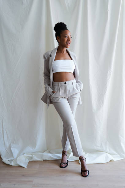 confident young manager woman posing wearing stylish business suit - fashion stock pictures, royalty-free photos & images