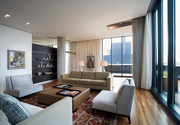 contemporary living room in loft condominium - home decoration stock pictures, royalty-free photos & images