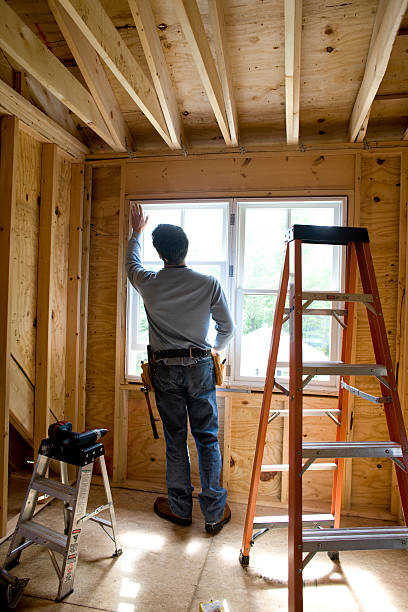 contractor working on window in new home - home decoration stock pictures, royalty-free photos & images