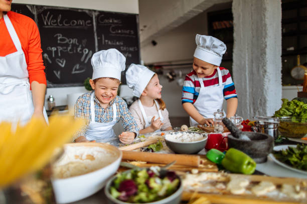 cooking is fun! - food stock pictures, royalty-free photos & images