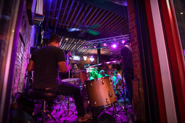 country music bands plays in a bar in nashville tennessee usa - concert stock pictures, royalty-free photos & images