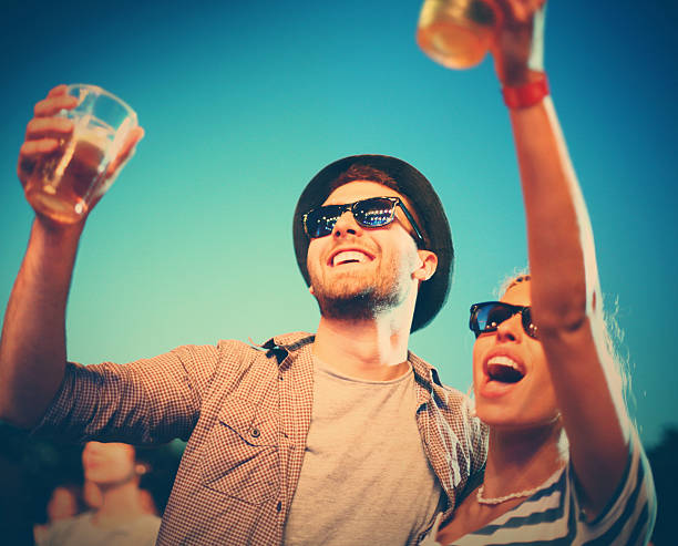 couple having fun at concert. - concert stock pictures, royalty-free photos & images