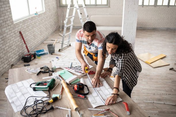 couple making home improvement and measuring - home decoration stock pictures, royalty-free photos & images