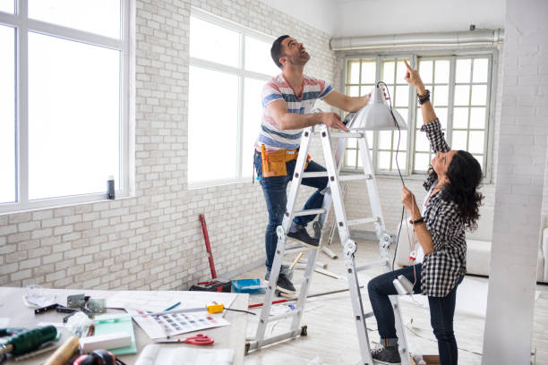 couple renovating their apartment - home decoration stock pictures, royalty-free photos & images