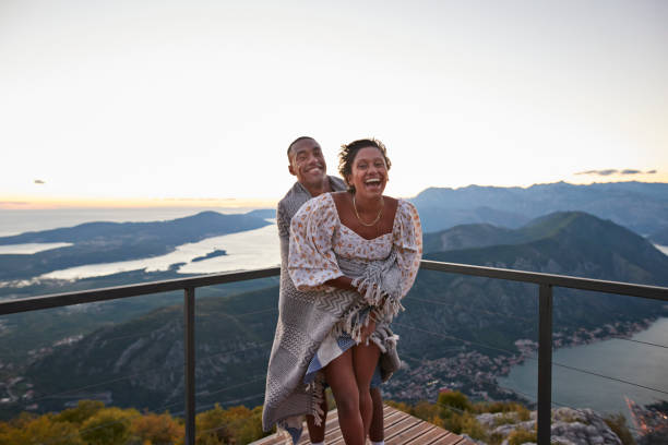 couple spending leisure time during sunset - travel stock pictures, royalty-free photos & images