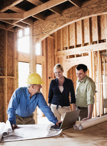 couple with home builder - home decoration stock pictures, royalty-free photos & images