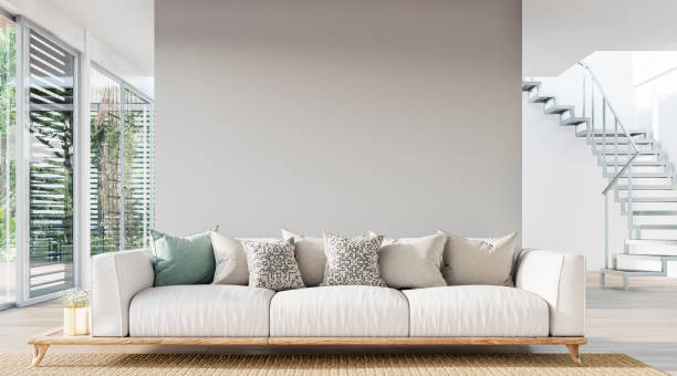 cozy, luxury, and modern living room with sofa, windows and decoration - a close up on the sofa - garden decoration stock pictures, royalty-free photos & images