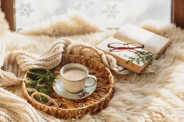 cozy winter composition with coffee and warm scarf - home decoration stock pictures, royalty-free photos & images