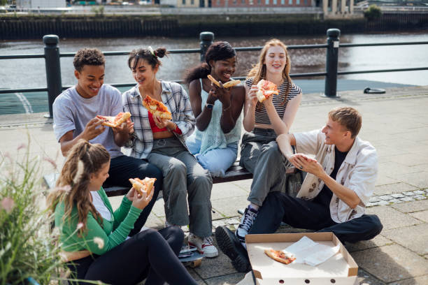creating memories with friends - junk food stock pictures, royalty-free photos & images