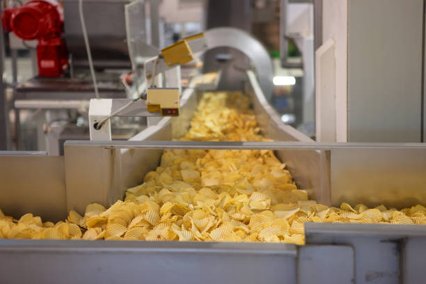 crisp factory - food stock pictures, royalty-free photos & images