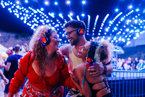 crowd of people partying on summer festival. - concert stock pictures, royalty-free photos & images