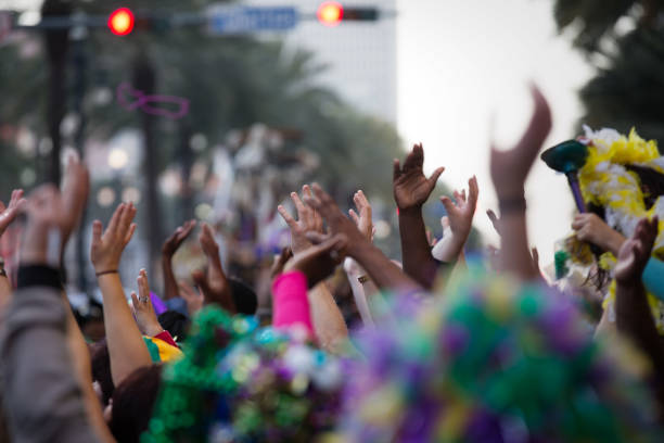 crowd partying and raising hands during festival - concert stock pictures, royalty-free photos & images