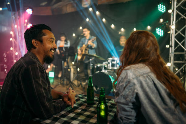 crowd people in nightclub. - concert stock pictures, royalty-free photos & images