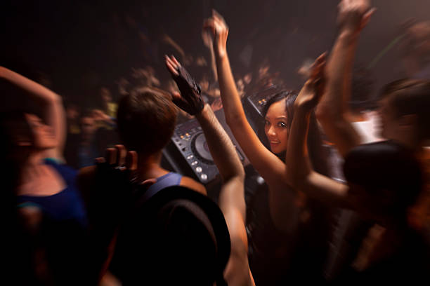 crowded night club - concert stock pictures, royalty-free photos & images