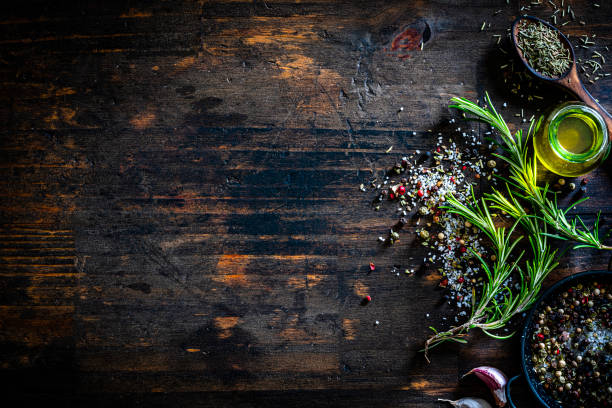 culinary border of rosemary, salt, pepper and oil - food stock pictures, royalty-free photos & images