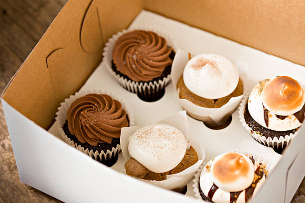 cupcakes to go - junk food stock pictures, royalty-free photos & images
