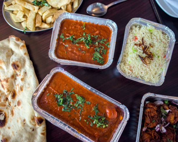 curry indian takeaway - junk food stock pictures, royalty-free photos & images
