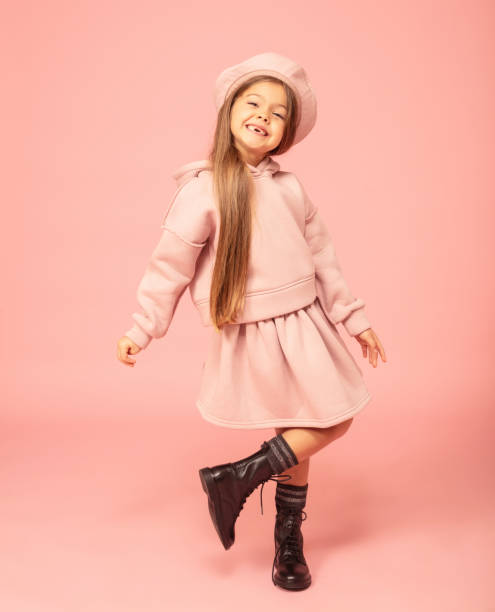 cute little girl with lost front milk teeth. - fashion stock pictures, royalty-free photos & images