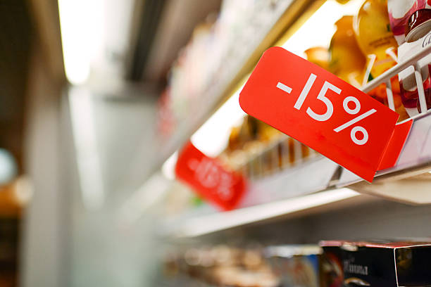 dairy discount in grocery store - food stock pictures, royalty-free photos & images