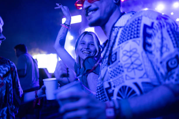 dancing on a music festival! - concert stock pictures, royalty-free photos & images