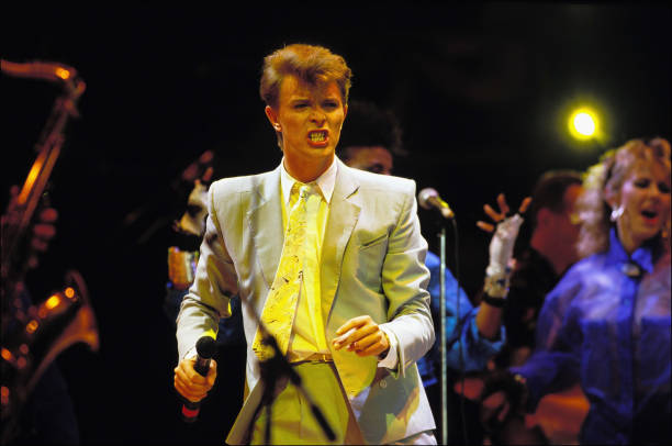 David Bowie performs on stage during the Live Aid concert at Wembley Stadium on 13 July, 1985 in London, England.