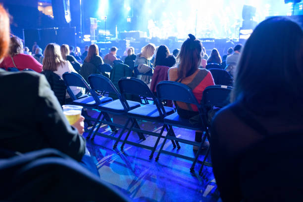 December 2021, Hamburg: Due to the Corona requirements, several chairs between the spectators in front of the stage are unoccupied. Numerous...