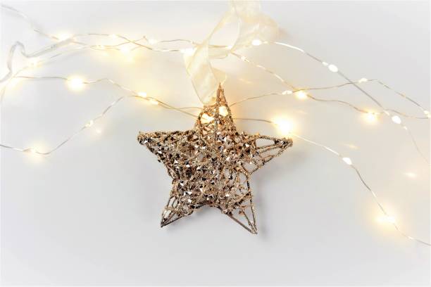 decorative christmas background with lights and star - home decoration stock pictures, royalty-free photos & images