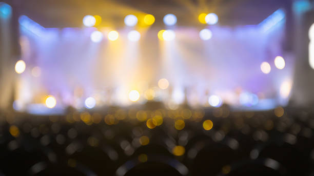 defocused illuminated lights at night music festival - concert stock pictures, royalty-free photos & images