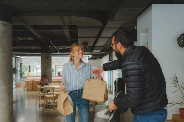 delivering food to the office - food stock pictures, royalty-free photos & images