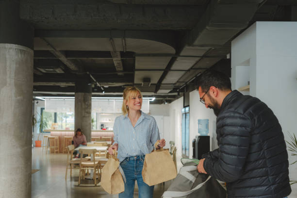 delivering food to the office - junk food stock pictures, royalty-free photos & images