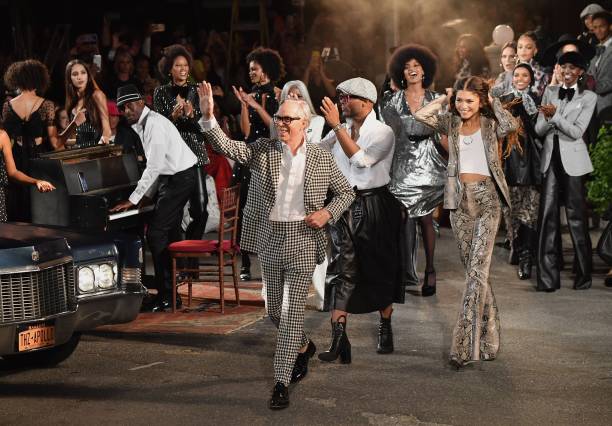 Designer Tommy Hilfiger and actress Zendaya walk the runway at the Tommy Hilfiger TommyNow fall runway show at the Apollo Theater on September 8,...