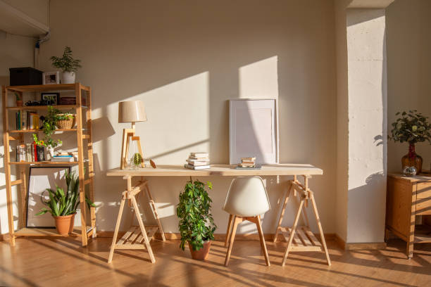 desktop for home office made by timber and sawhorses in a nordic style apartment. mockup frame empty copy space - home decoration stock pictures, royalty-free photos & images