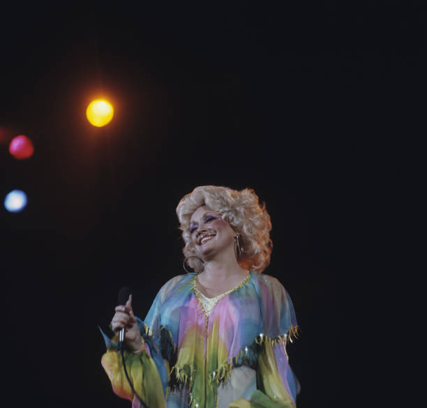 Dolly Parton performs on stage at the Hammersmith Odeon in London, England on November 20, 1978.