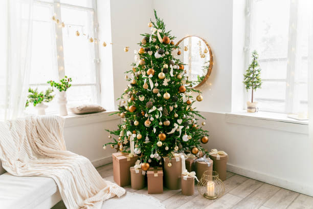 domestic living room decorated with christmas fir tree and holiday decor - home decoration stock pictures, royalty-free photos & images