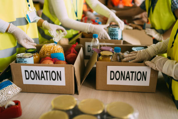donation for poor people - food stock pictures, royalty-free photos & images