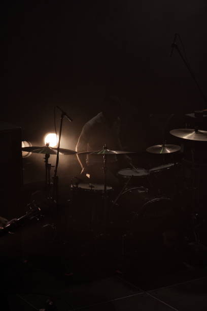 drum player in a live show - concert stock pictures, royalty-free photos & images
