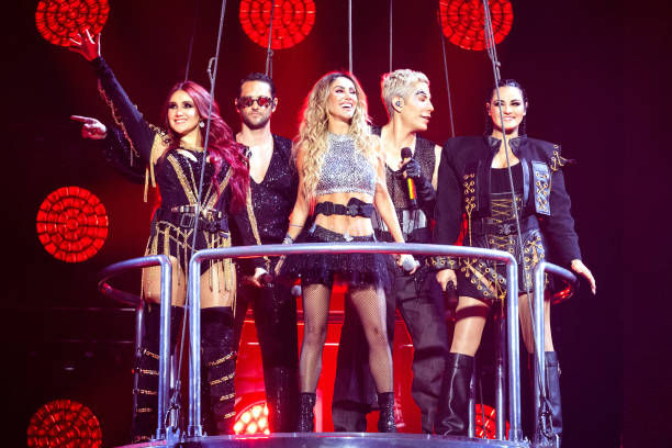 Dulce Maria, Christopher von Uckermann, Anahí, Christian Chávez, and Maite Perroni of RBD perform in concert during the "Soy Rebelde Tour" at Moody...