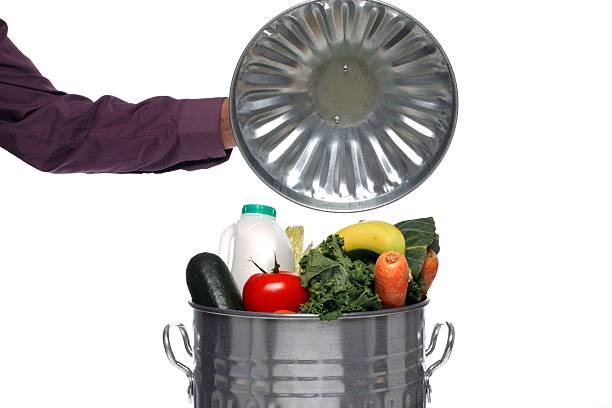 dust bin full of fresh food, studio shot - food stock pictures, royalty-free photos & images