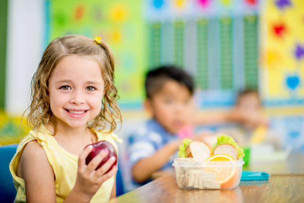 eating an apple - food stock pictures, royalty-free photos & images