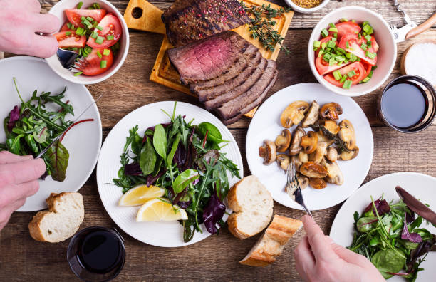 eating tasty food. favorite meal - food stock pictures, royalty-free photos & images
