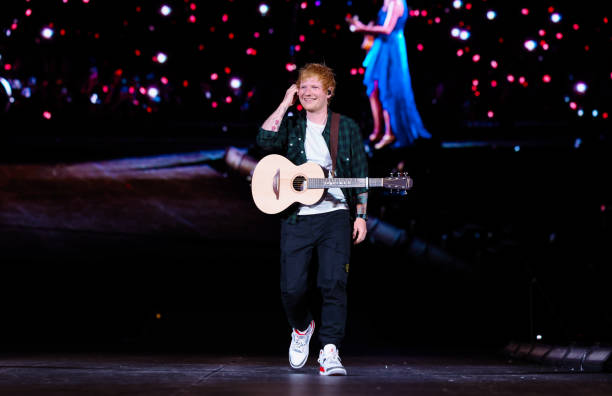Ed Sheeran performs onstage with Taylor Swift during "Taylor Swift | The Eras Tour" at Wembley Stadium on August 15, 2024 in London, England.