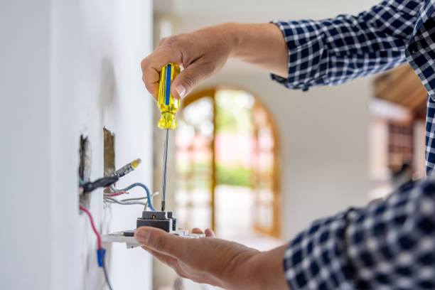 electrician installing a power outlet while remodeling a house - home decoration stock pictures, royalty-free photos & images