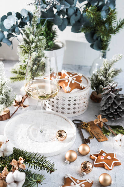 elegant wine glass in bright christmas winter scene - home decoration stock pictures, royalty-free photos & images
